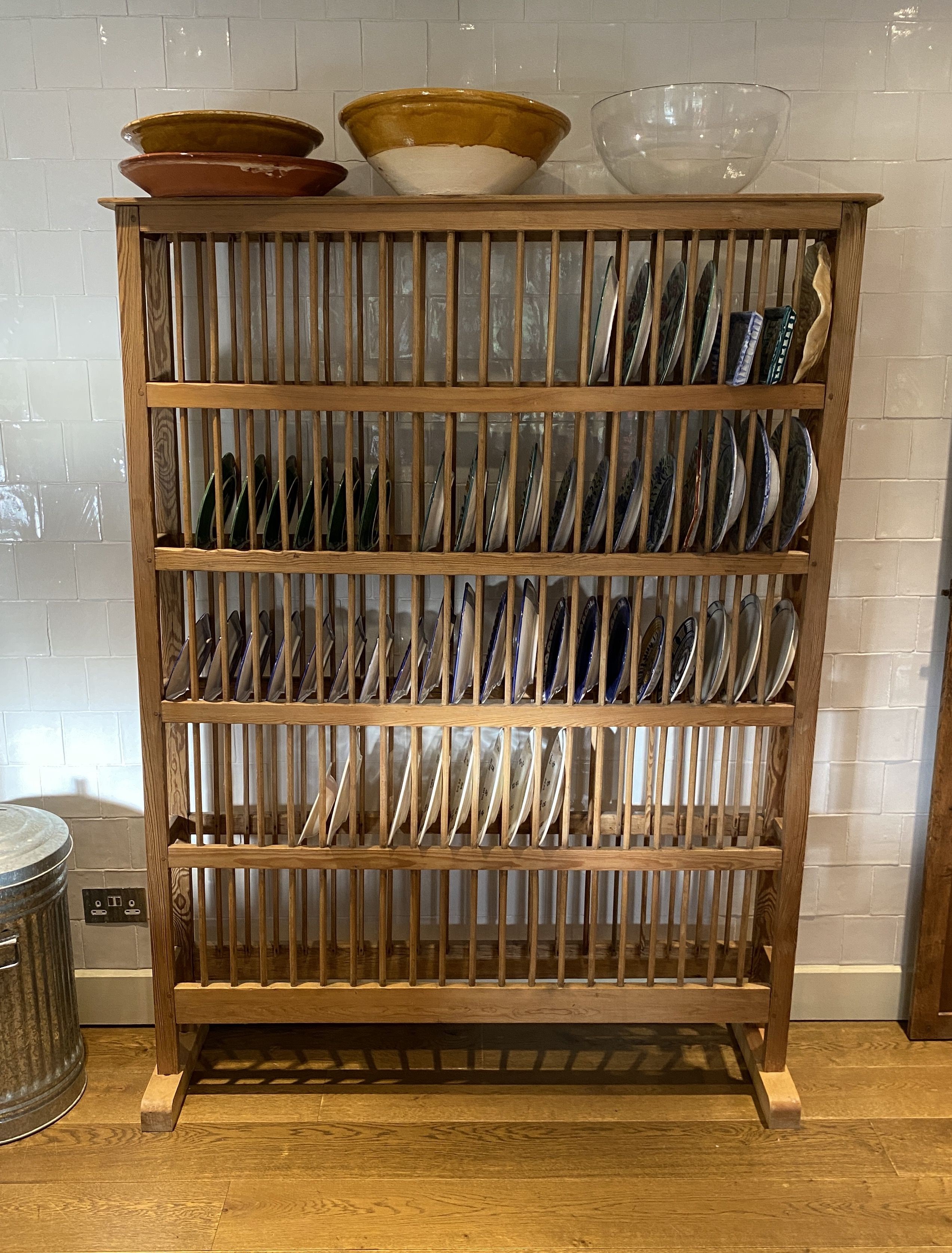 An unusually large Victorian pine and ash freestanding five tier plate rack, width 140cm height 186cm